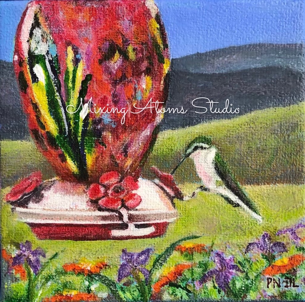 Hummingbird on Feeder